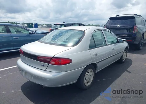 1999 Ford Escort Lx z USA, uszkodzony, nr VIN 1FAFP10P6XW164410